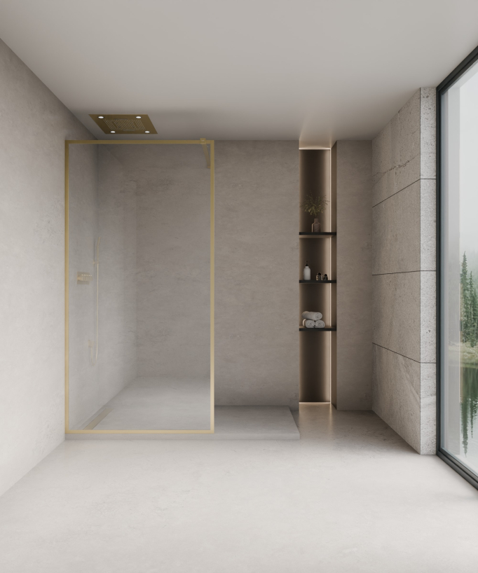Paroi douche en verre trempé Sécurit transparent délimitée par des profilés doré brossé formant un cadre posée sur un receveur de douche plat